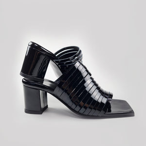 Strappy leather heeled sandals in black color