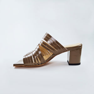 Strappy leather heeled sandals in light brown color