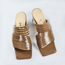 Strappy leather heeled sandals in light brown color